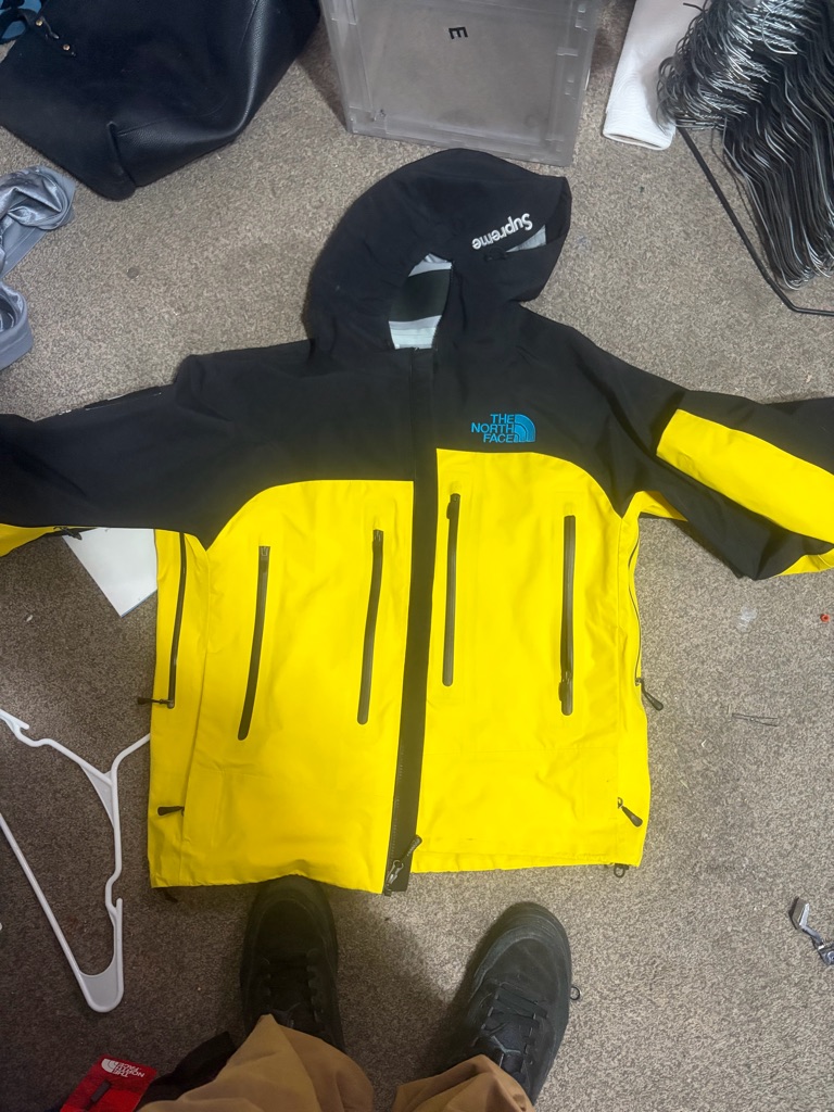 The North Face Black And Yellow Waterproof Hooded Jacket